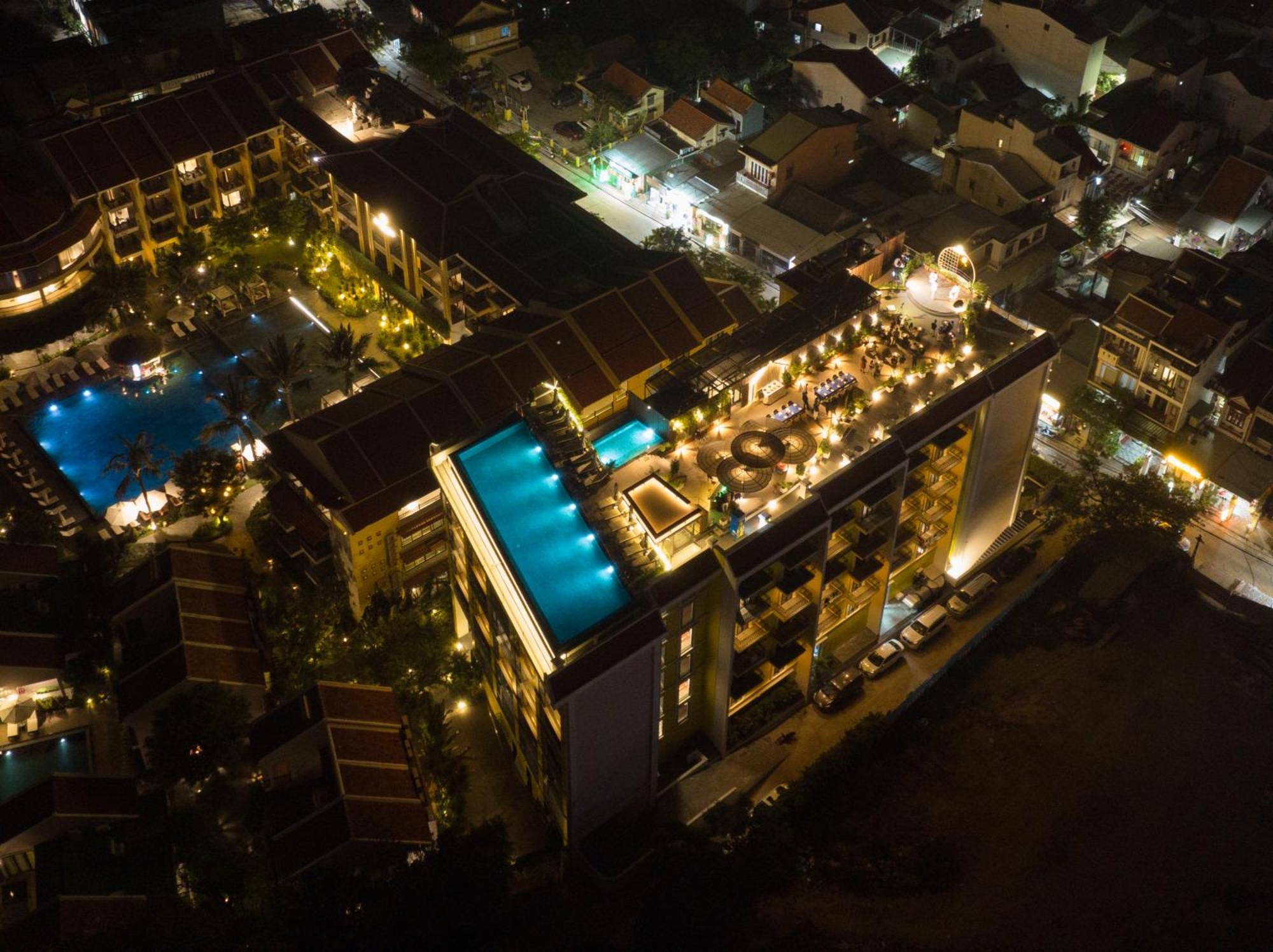 Bel Marina Hoi An Resort Экстерьер фото Aerial view of the resort at night
