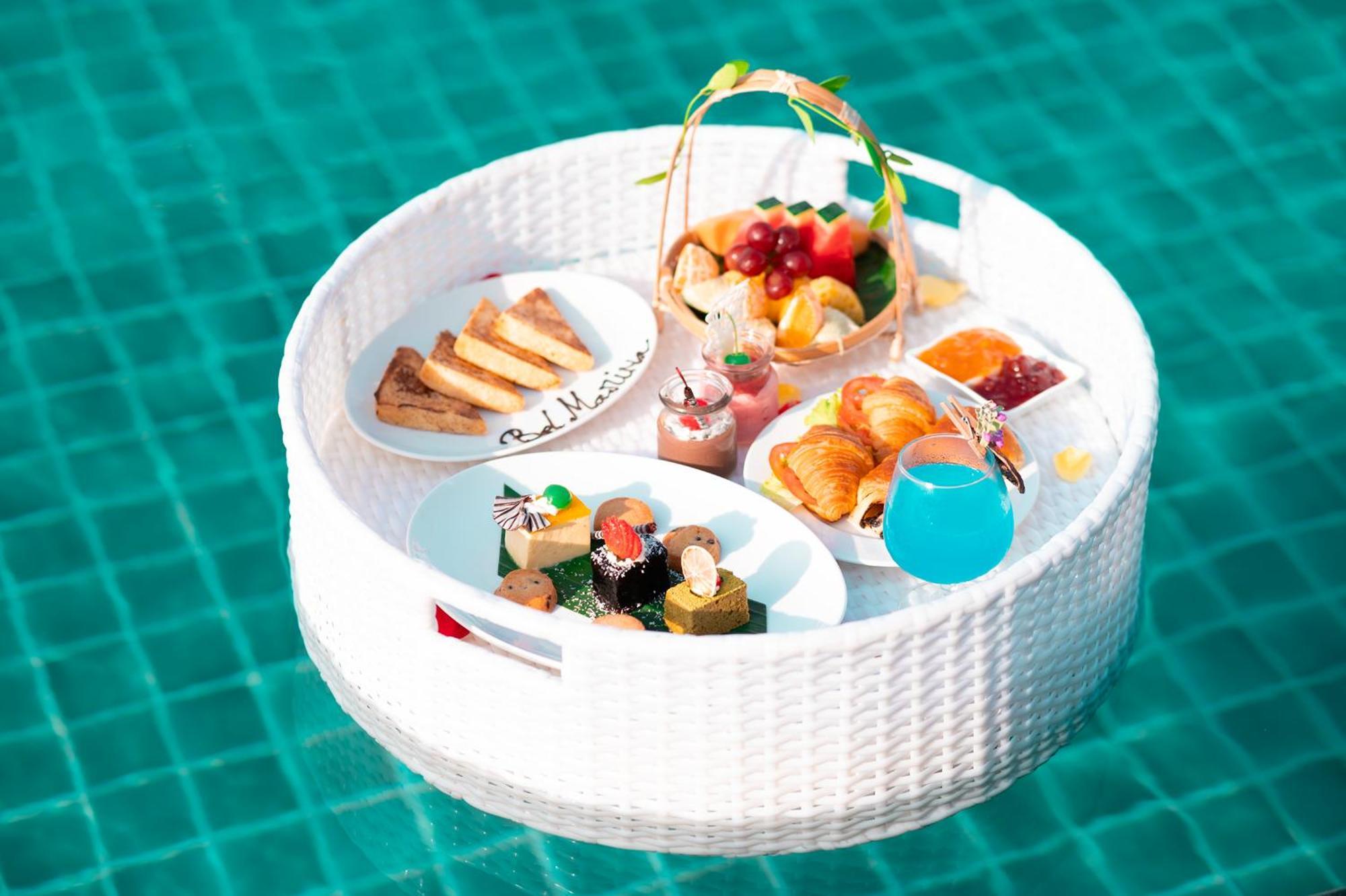 Bel Marina Hoi An Resort Экстерьер фото A floating breakfast tray